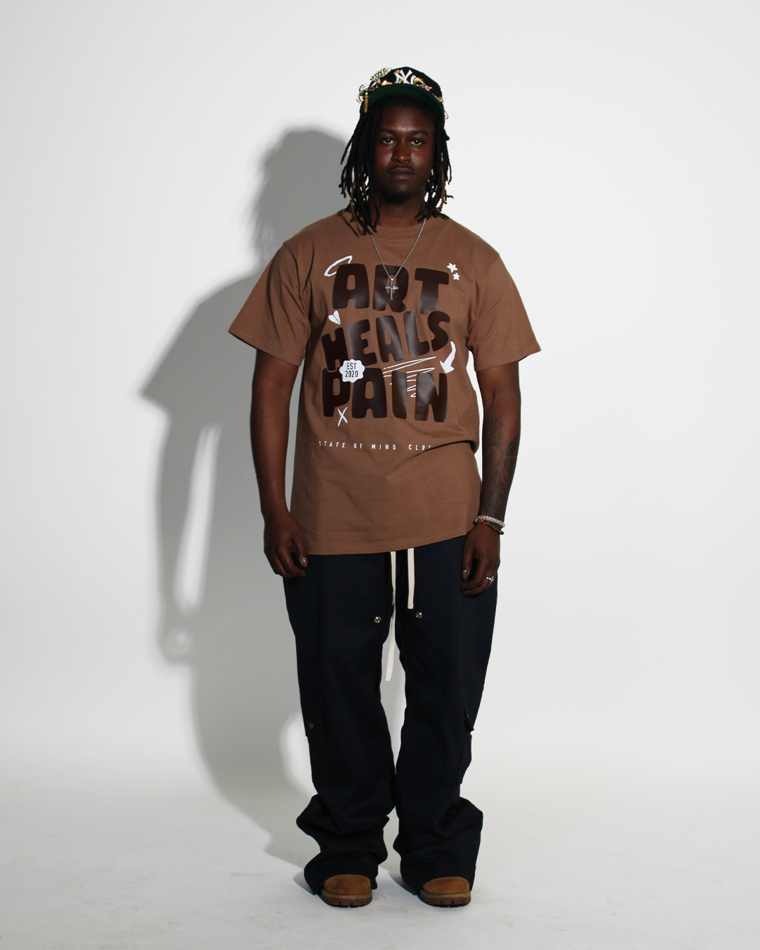 Tan/Brown "Art Heals Pain" T-Shirt